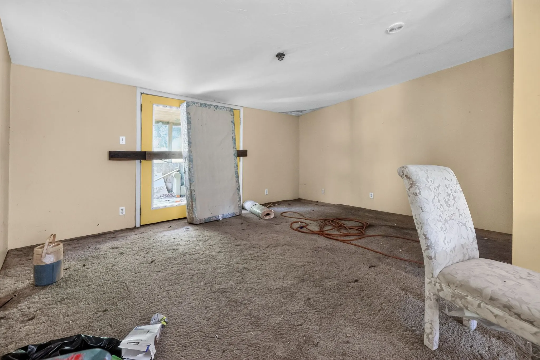 Interior room with boarded glass doors at 1929 Revis Pl