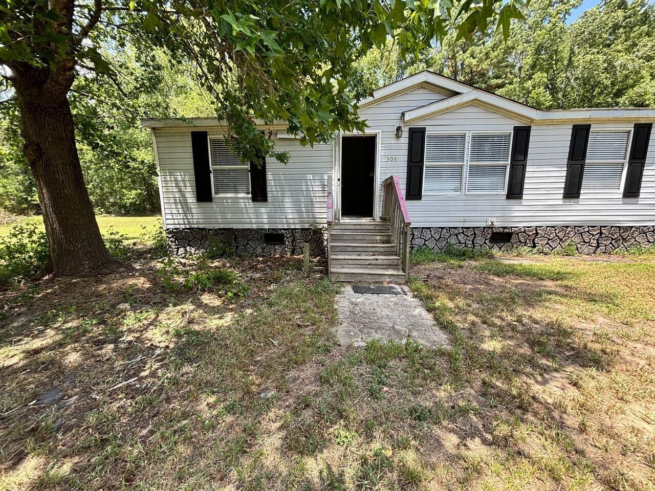 304 Katlyn Place, as-is manufactured home on acreage in Cottageville SC