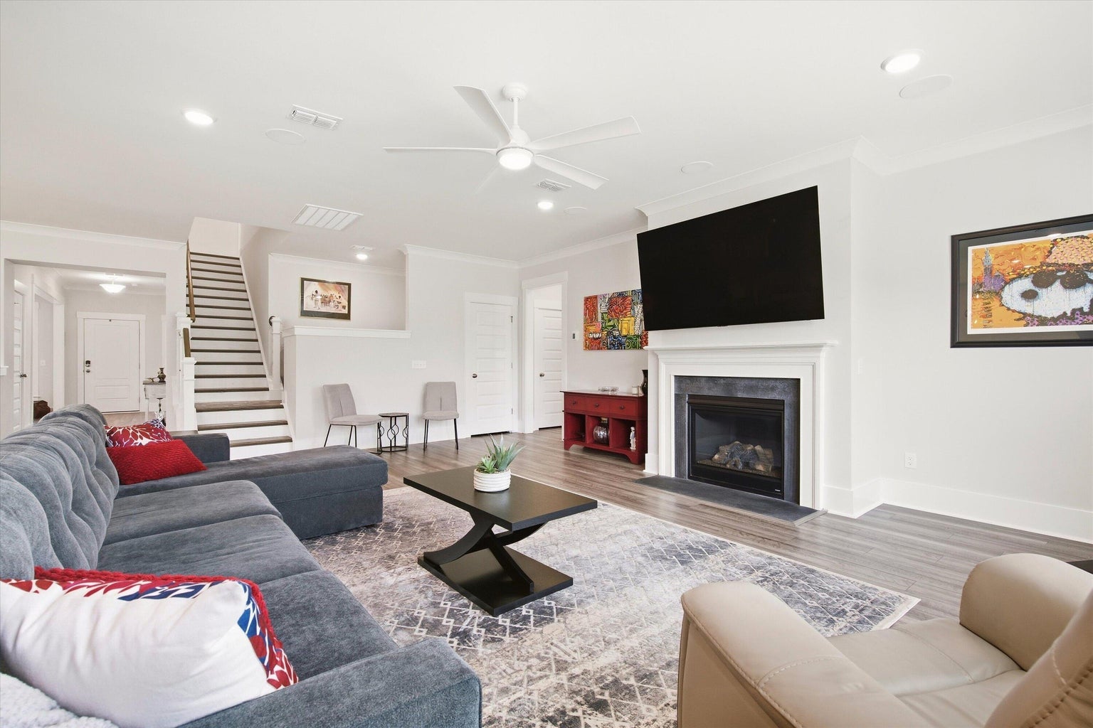 Extended living room with a fireplace
